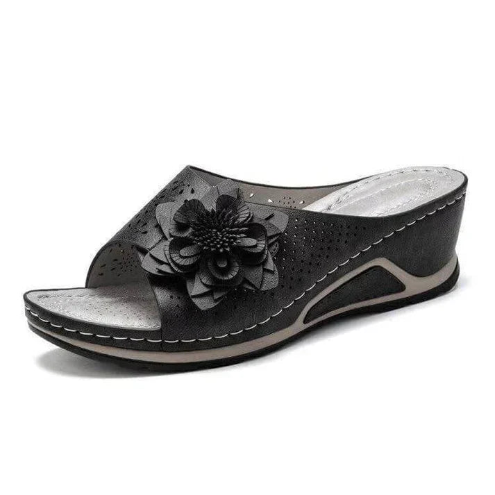 Sandalias ortopedicas de piel suave con soporte para el arco del pie.