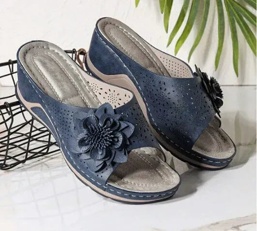 Sandalias ortopedicas de piel suave con soporte para el arco del pie.